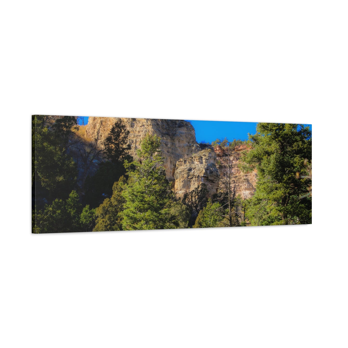 Canvas Print - Towering Cliff Green Trees Blue Skies Photography