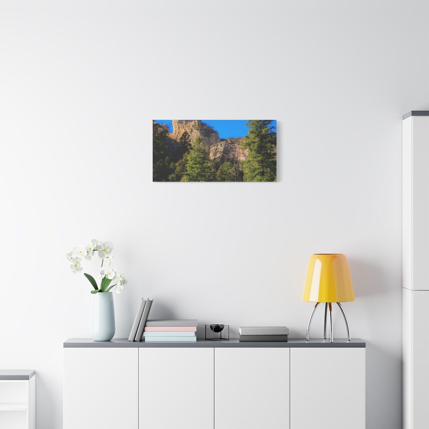 Canvas Print - Towering Cliff Green Trees Blue Skies Photography